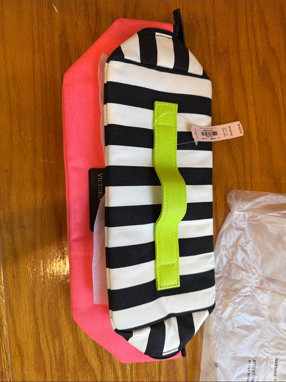 Striped Black & White Cosmetic Pouch with Neon Green Handle and Pink Sleeve